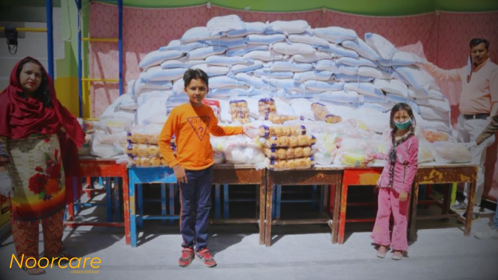 Sharing food rations with families, hand to hand